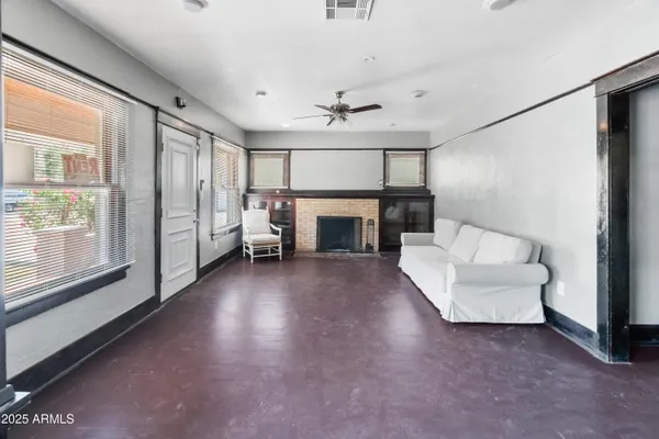 a view of house with backyard