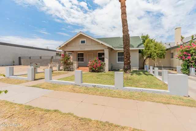 a white refrigerator freezer sitting inside of a kitchen