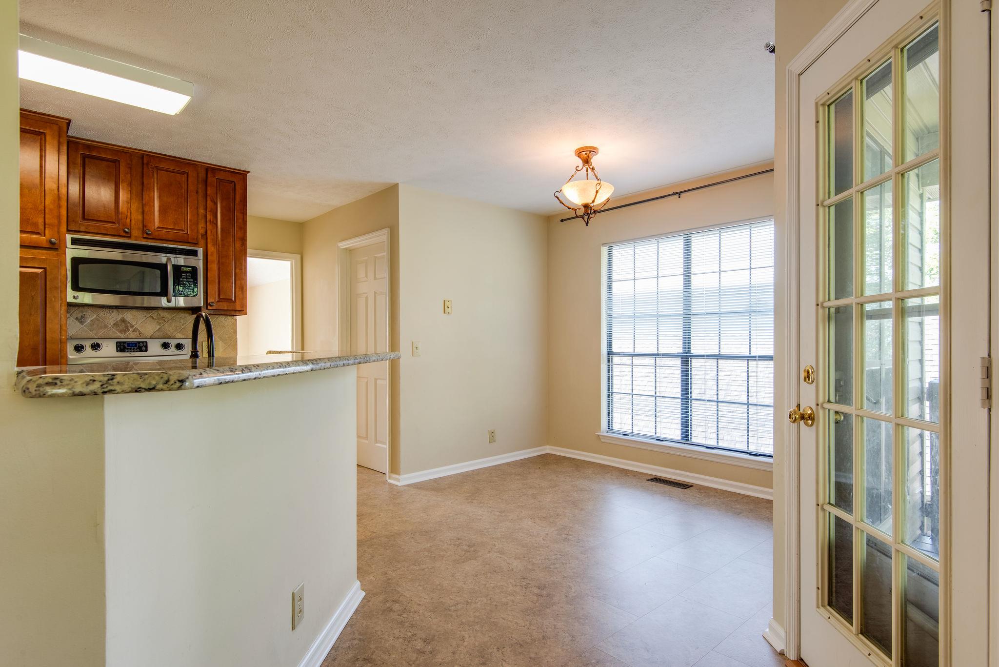 5633 Seesaw Road Nashville, TN 37211 - Photo 14 of 27 Breakfast room. New luxury vinyl floor