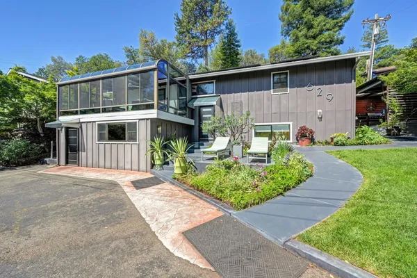 front view of a house with a yard