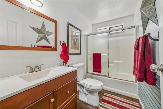 a bedroom with a bed and a furniture