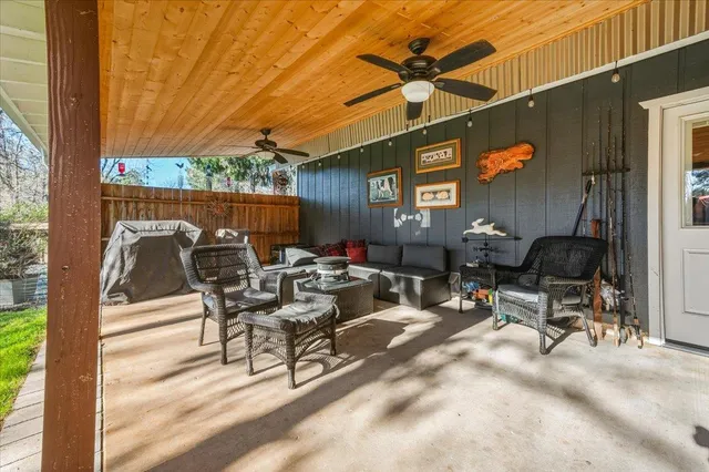 a view of yard with patio