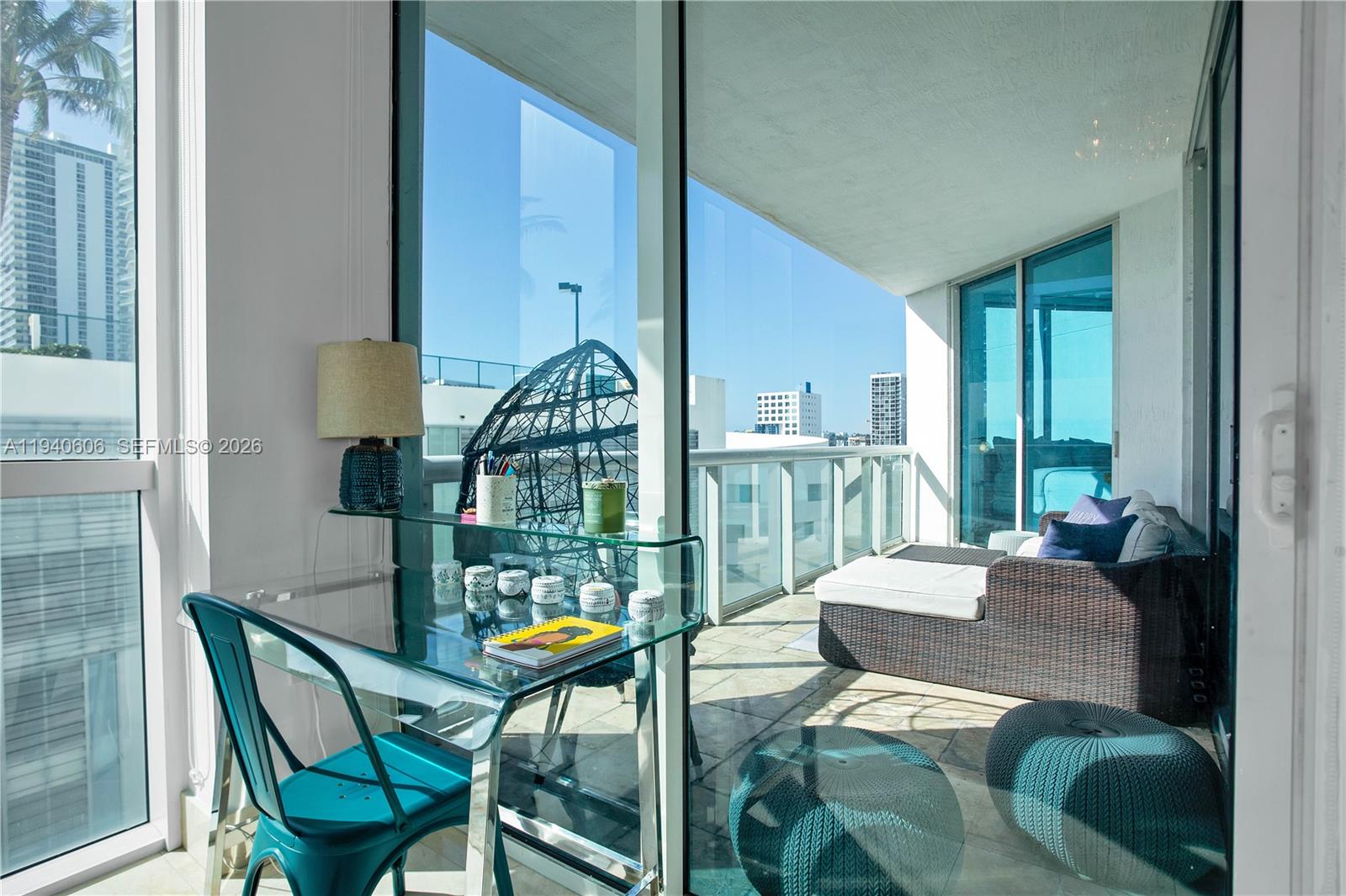 480 Northeast 30th Street, Unit 705 Miami, FL 33137 - Photo 22 of 32 a view of a dining room with furniture window and outside view