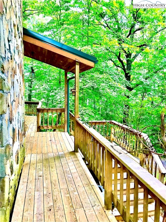 326 Buckshot Ridge Road Deep Gap, NC 28618 - Photo 3 of 29 a view of balcony with wooden floor