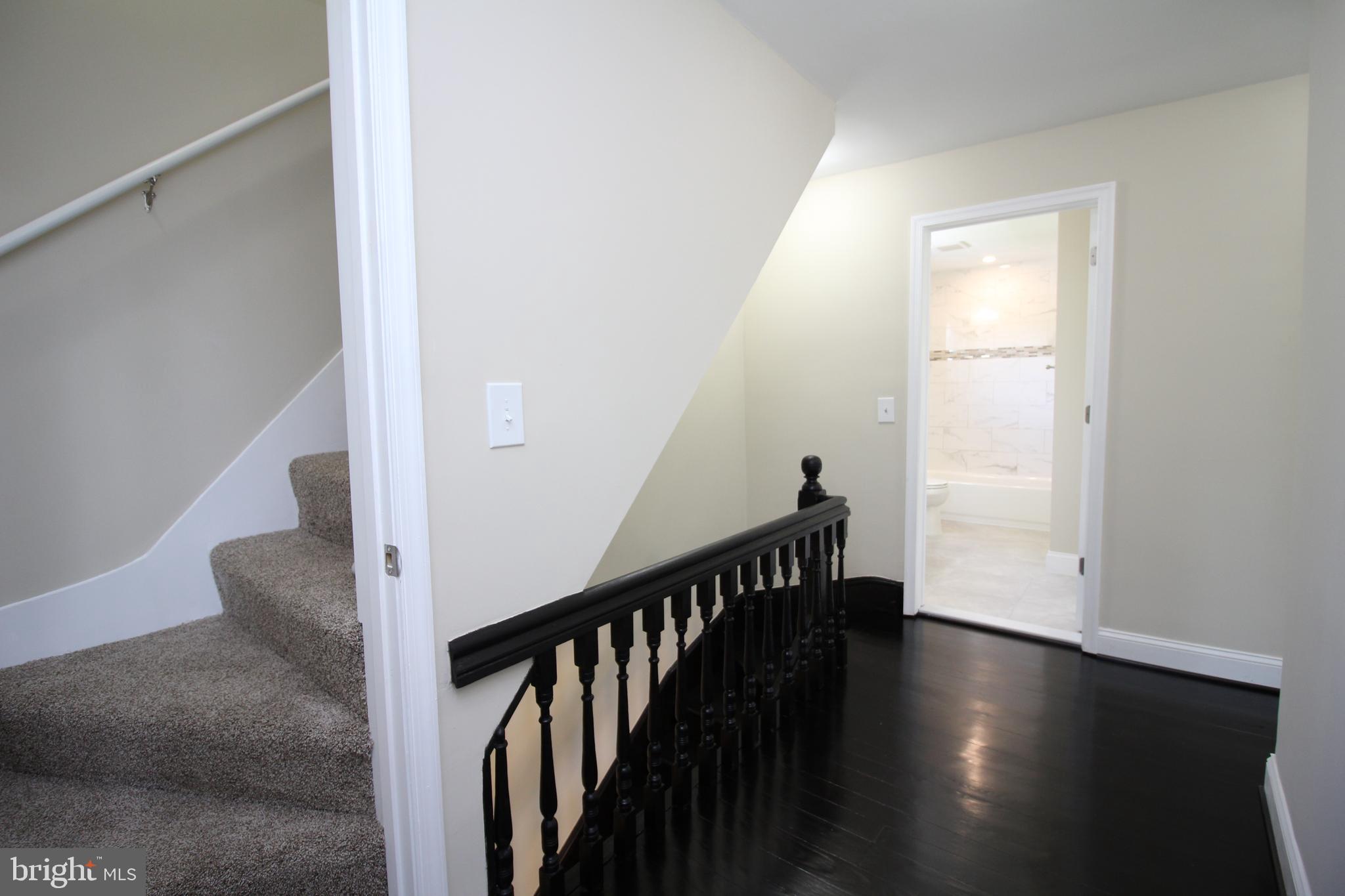 18030 Barnesville Road Barnesville, MD 20838 - Photo 24 of 39 Second Floor Landing, Hall Bath & Attic Staircase
