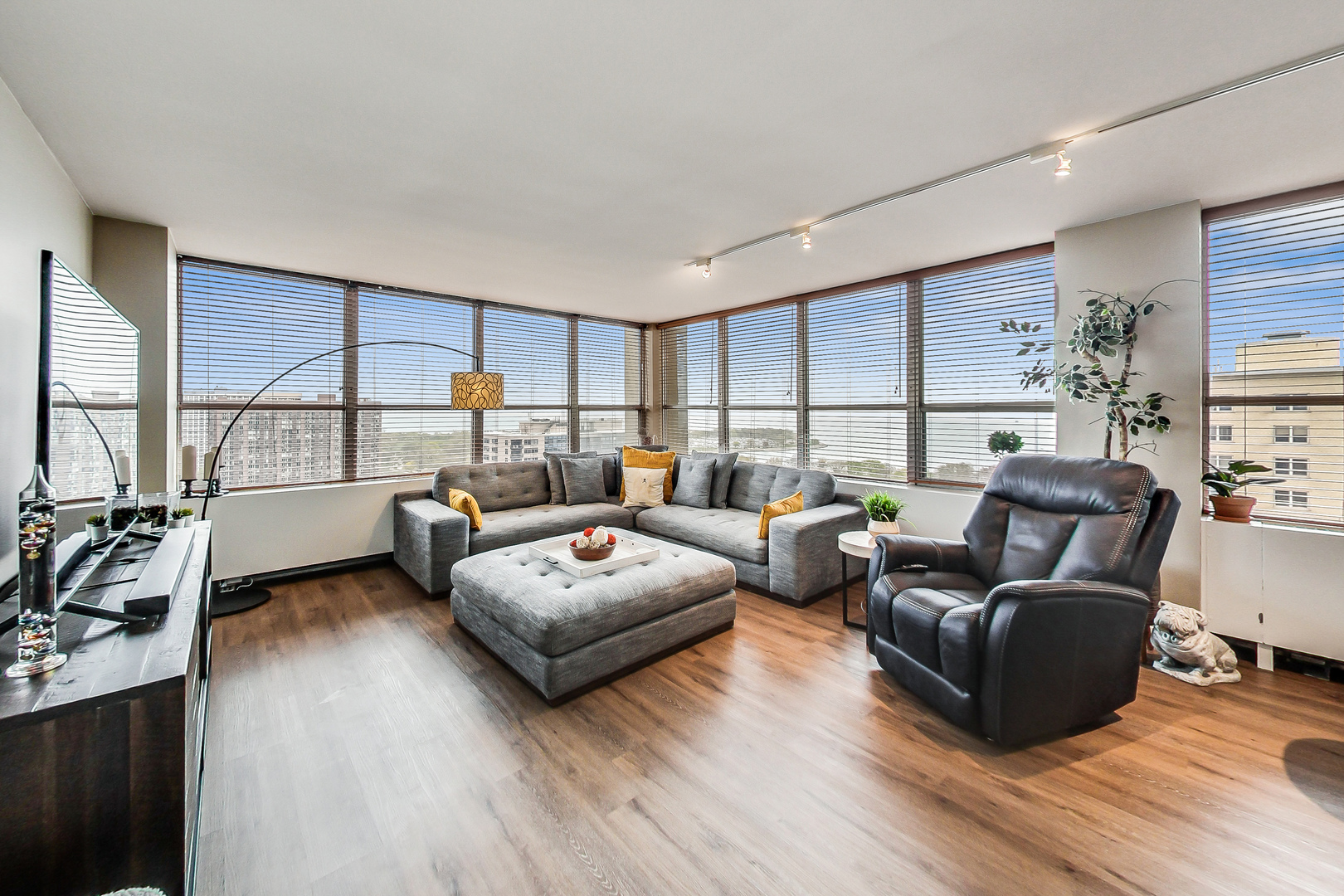 655 West Irving Park Road, Unit 2210 Chicago, IL 60613 - Photo 2 of 38 a living room with furniture window and a table