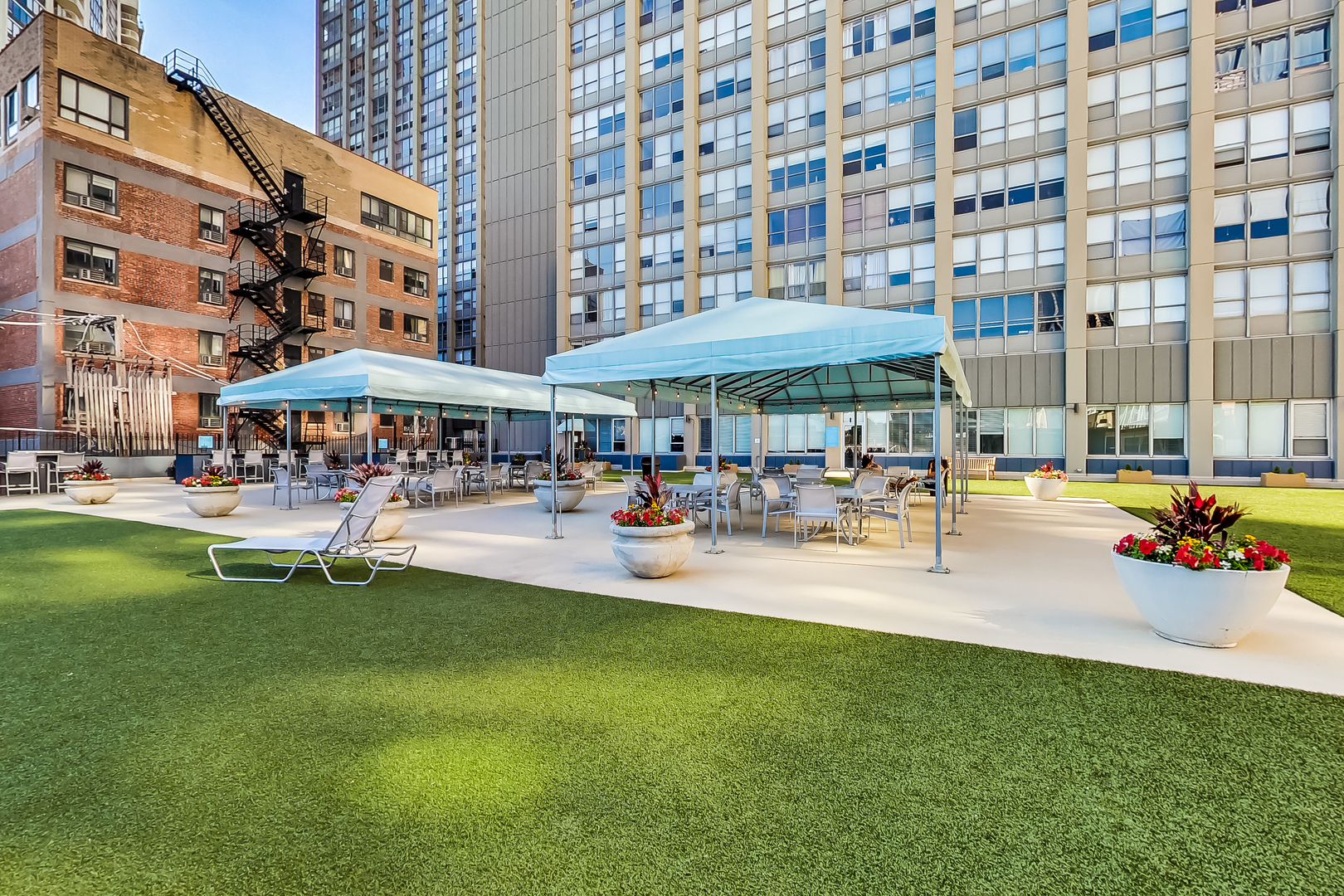 655 West Irving Park Road, Unit 2210 Chicago, IL 60613 - Photo 27 of 38 a view of a water fountain in the middle of a building