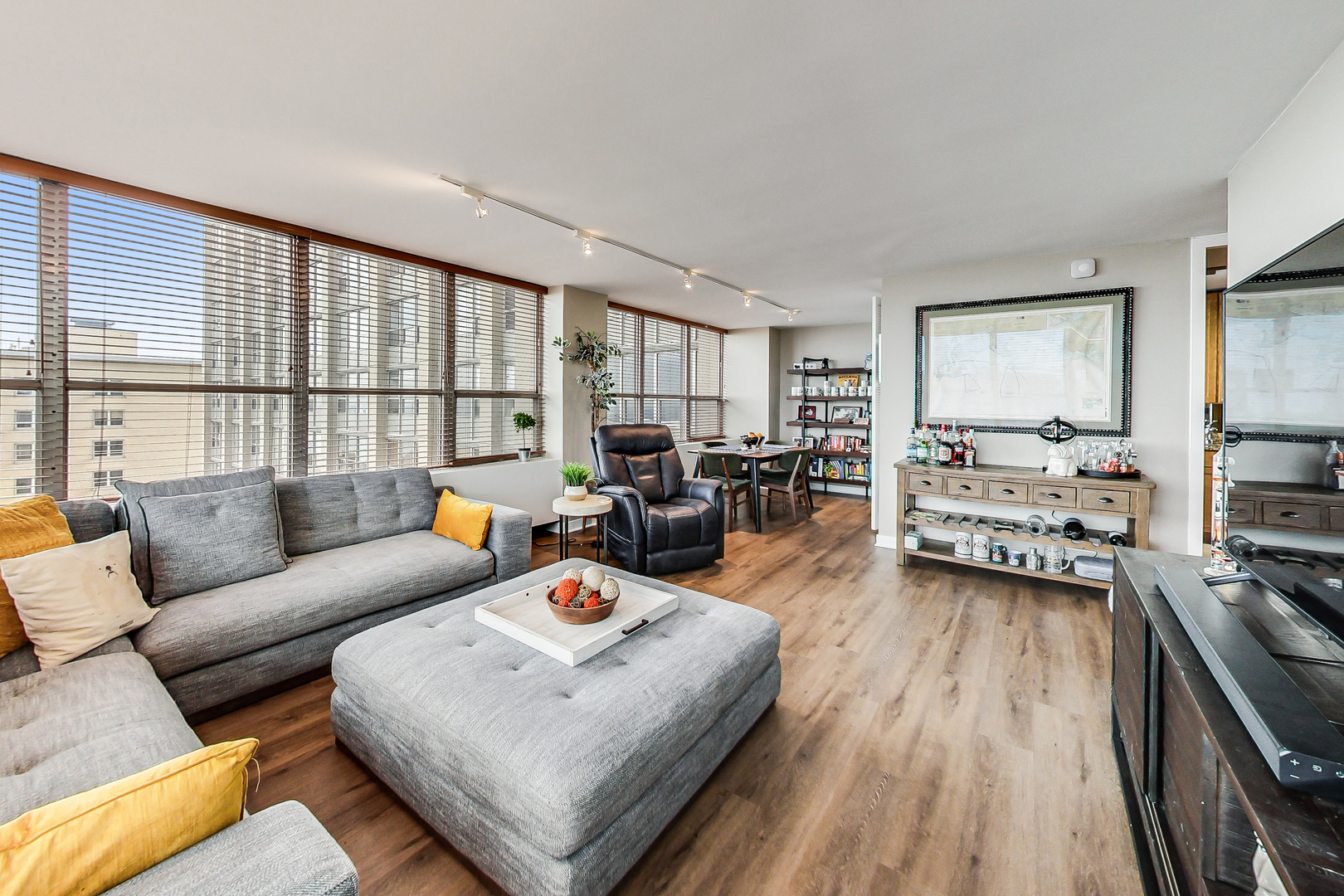 655 West Irving Park Road, Unit 2210 Chicago, IL 60613 - Photo 3 of 38 a living room with furniture and a large window