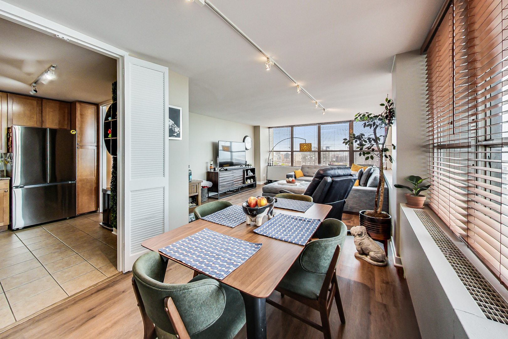 655 West Irving Park Road, Unit 2210 Chicago, IL 60613 - Photo 6 of 38 a view of a dining room with furniture
