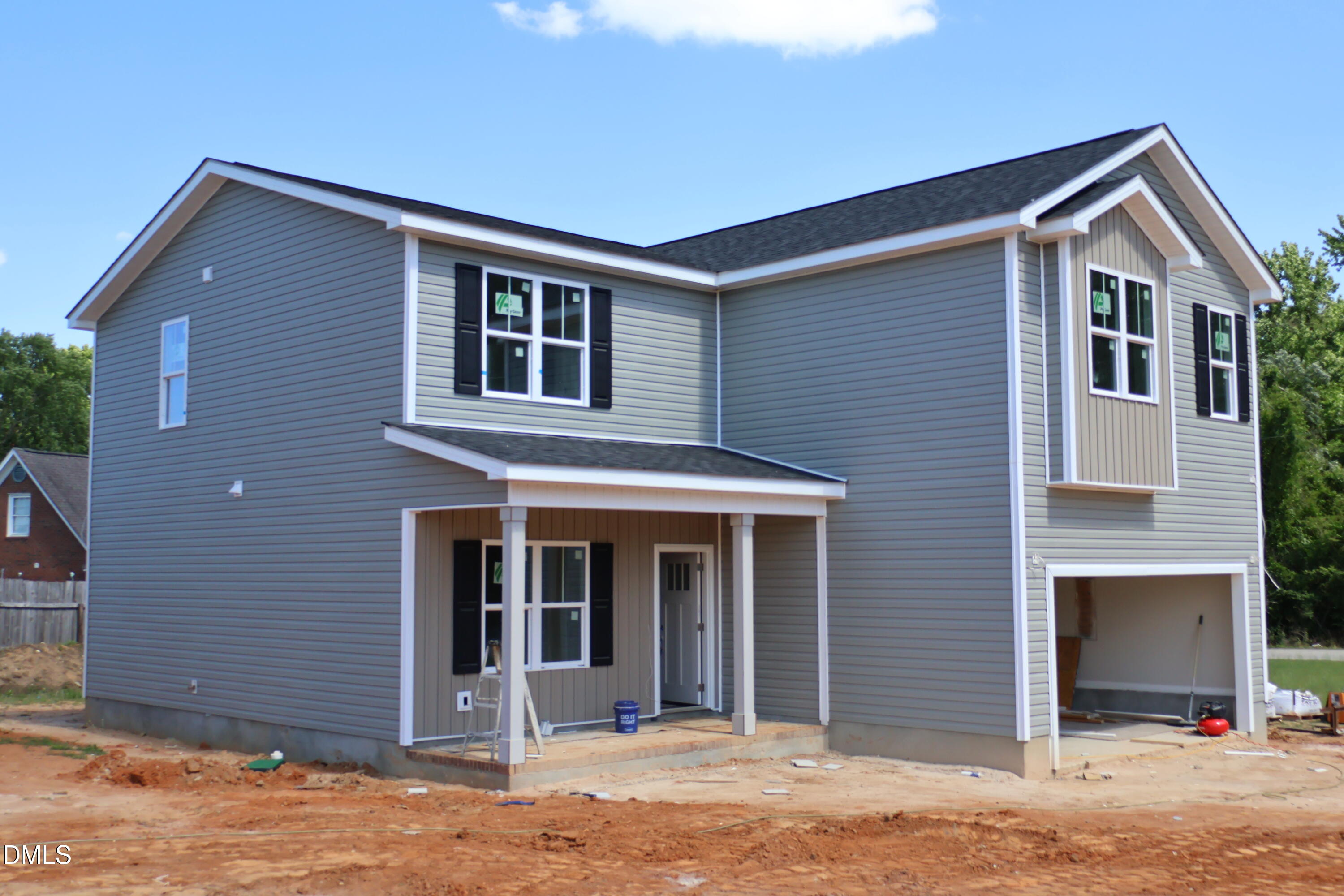 125 Wilson Street Erwin, NC 28339 - Photo 6 of 22 a front view of a house with a yard