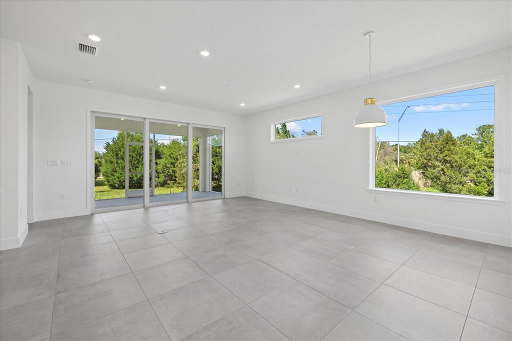 7443 South Seagrape Road Punta Gorda, FL 33955 - Photo 15 of 44 a view of an empty room with a window