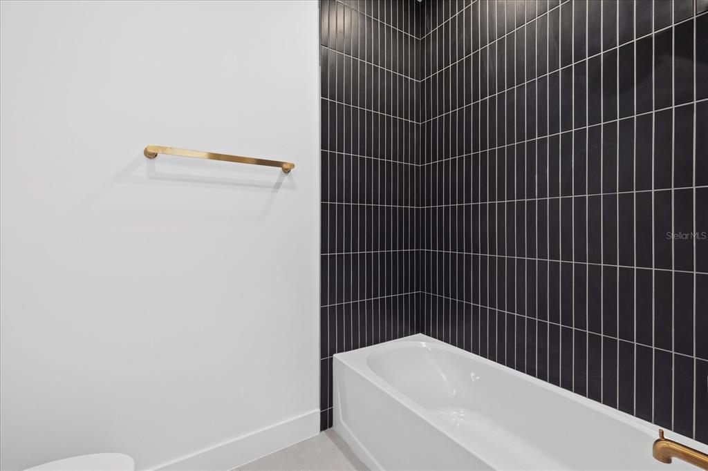 7443 South Seagrape Road Punta Gorda, FL 33955 - Photo 19 of 44 a bathroom with a bathtub