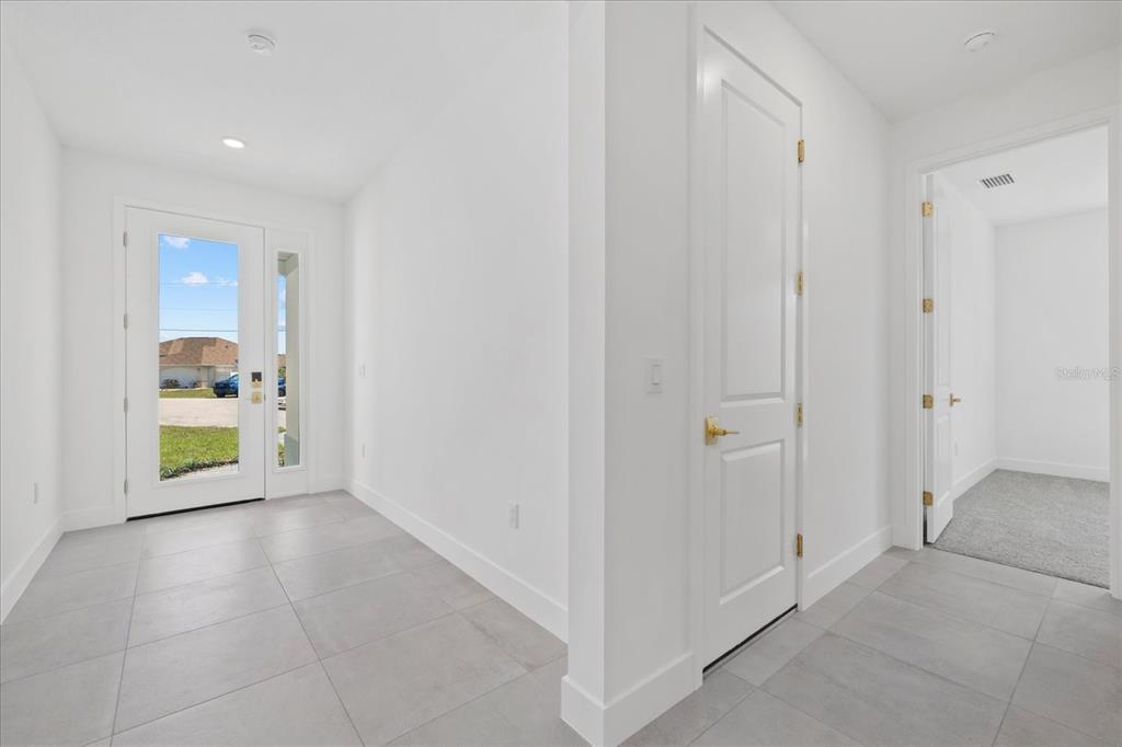 7443 South Seagrape Road Punta Gorda, FL 33955 - Photo 2 of 44 a view of an empty room and a window