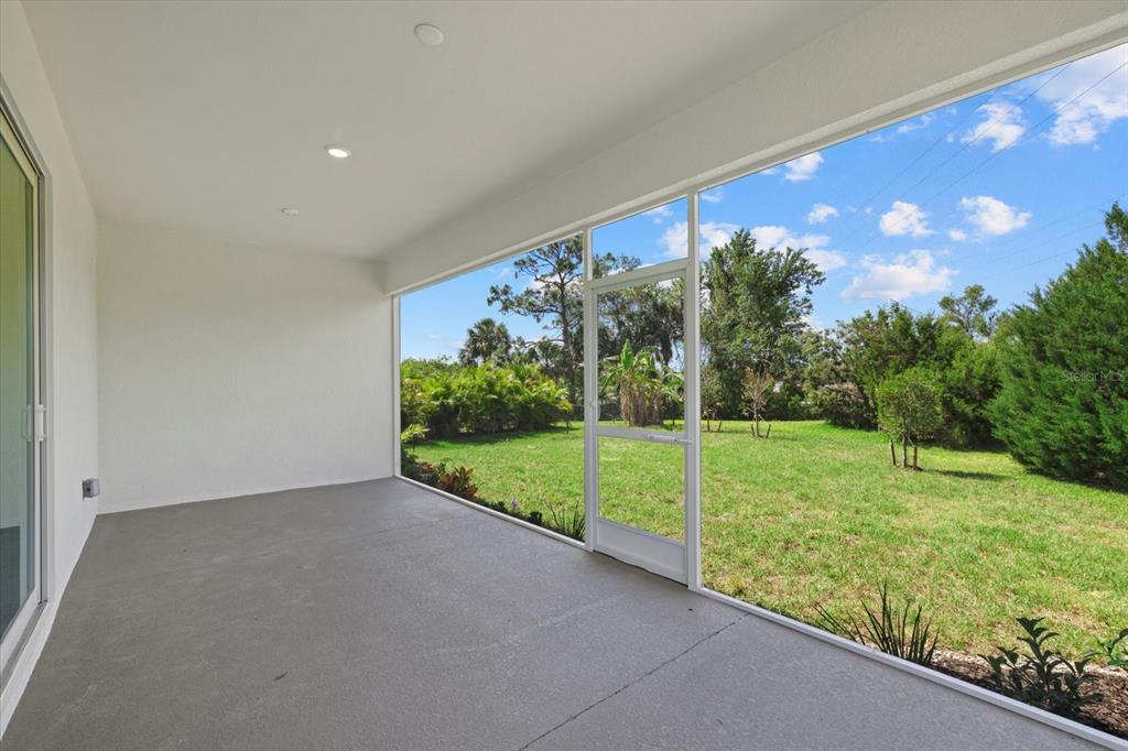 7443 South Seagrape Road Punta Gorda, FL 33955 - Photo 32 of 44 a view of a back yard