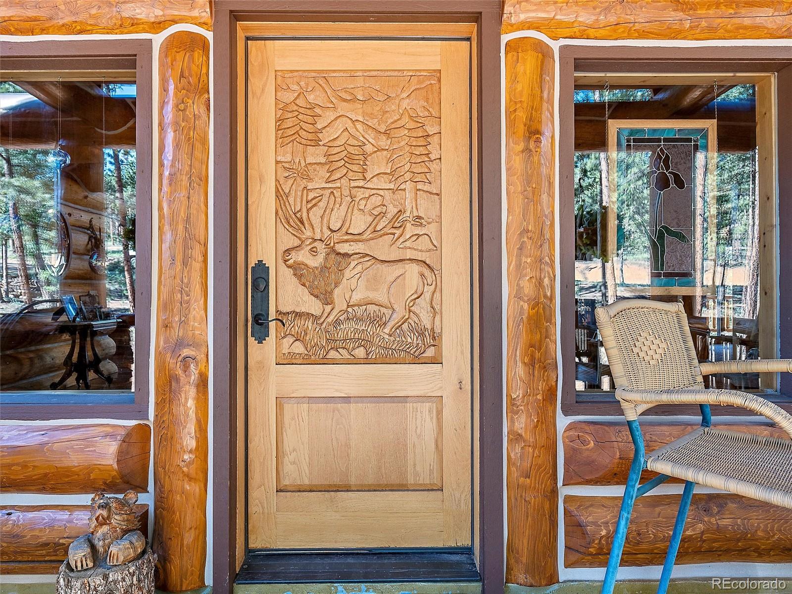 96 Six Bits Street Bailey, CO 80421 - Photo 11 of 40 a view of a door and chair