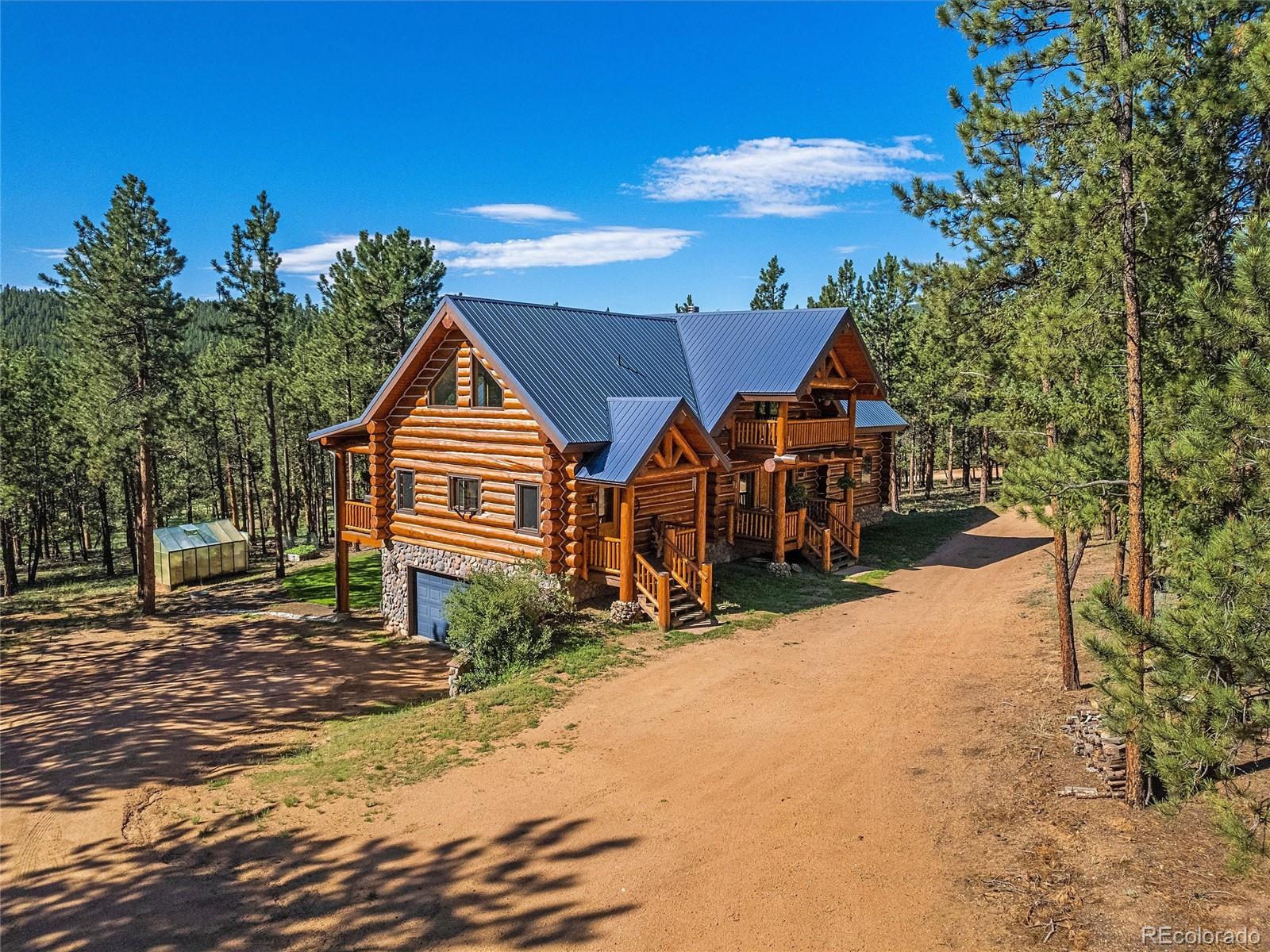 96 Six Bits Street Bailey, CO 80421 - Photo 2 of 40 a view of a house with a yard