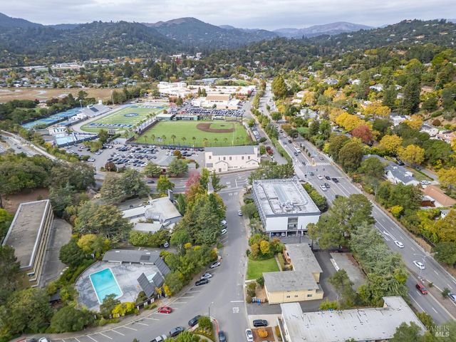 an aerial view of residential house with outdoor space