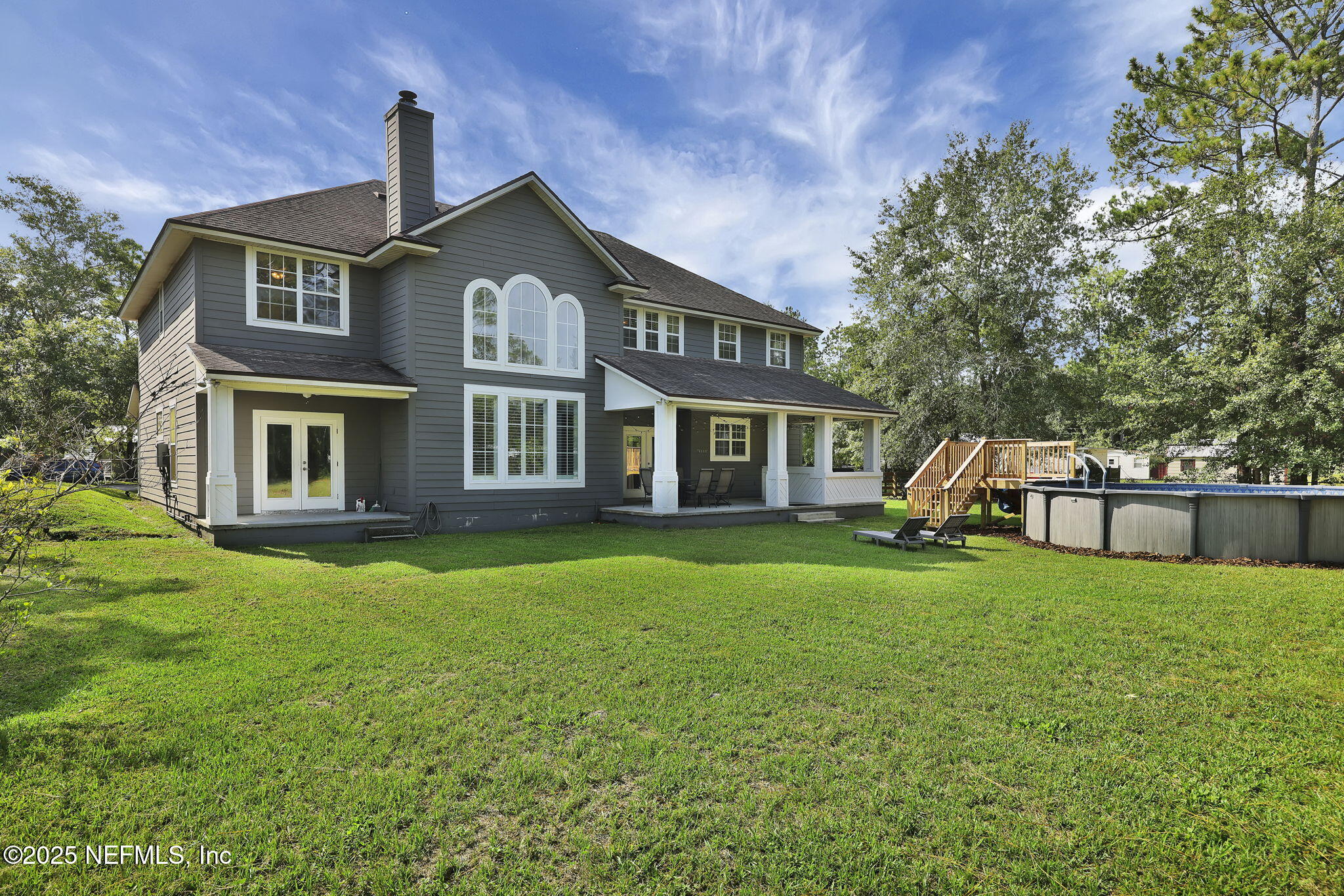 4385 Rues Landing Road St. Augustine, FL 32092 - Photo 54 of 67 a front view of a house with a yard