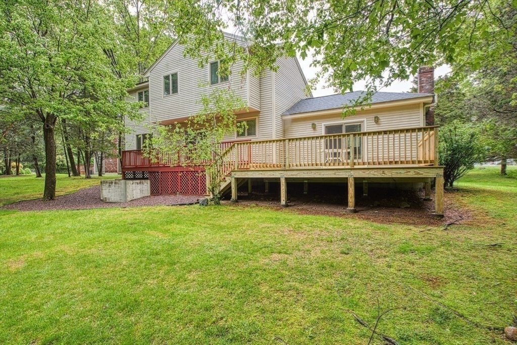 7 Tisdale Road Sharon, MA 02067 - Photo 31 of 37 a view of a house with a backyard