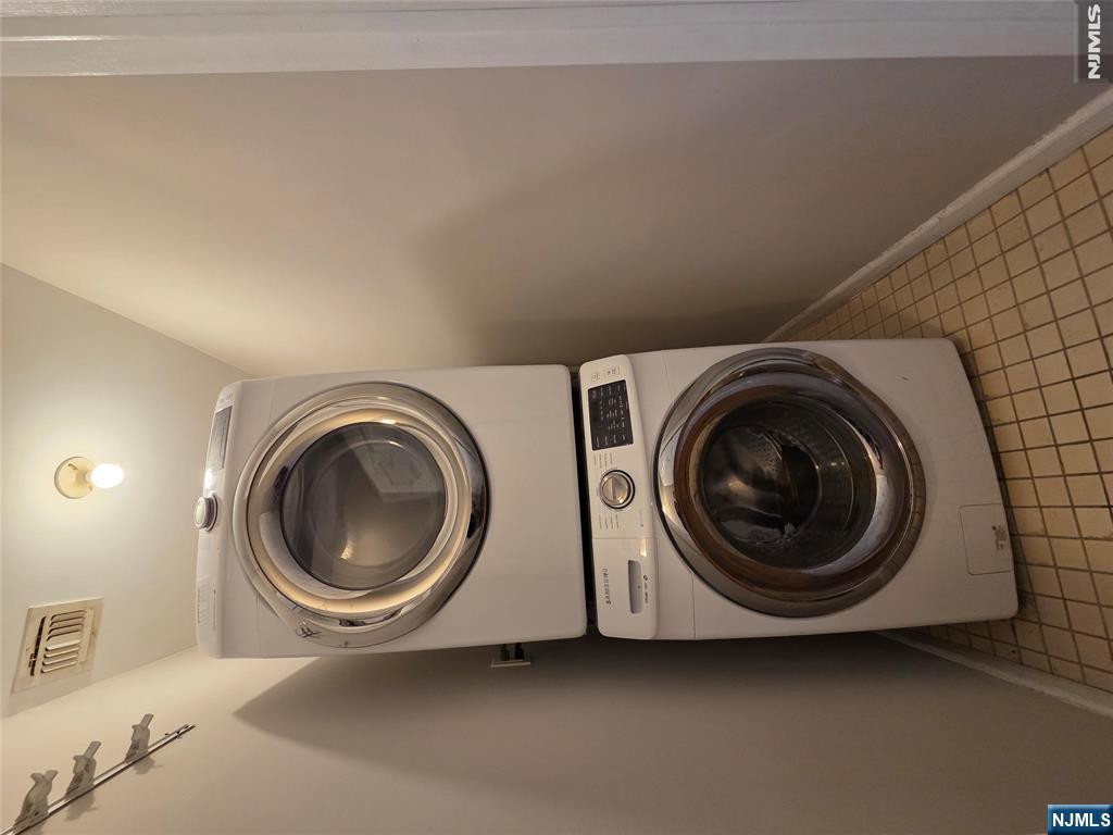 22 Broadway, Unit 2 Hackensack, NJ 07601 - Photo 10 of 11 a close up view of a washer and dryer
