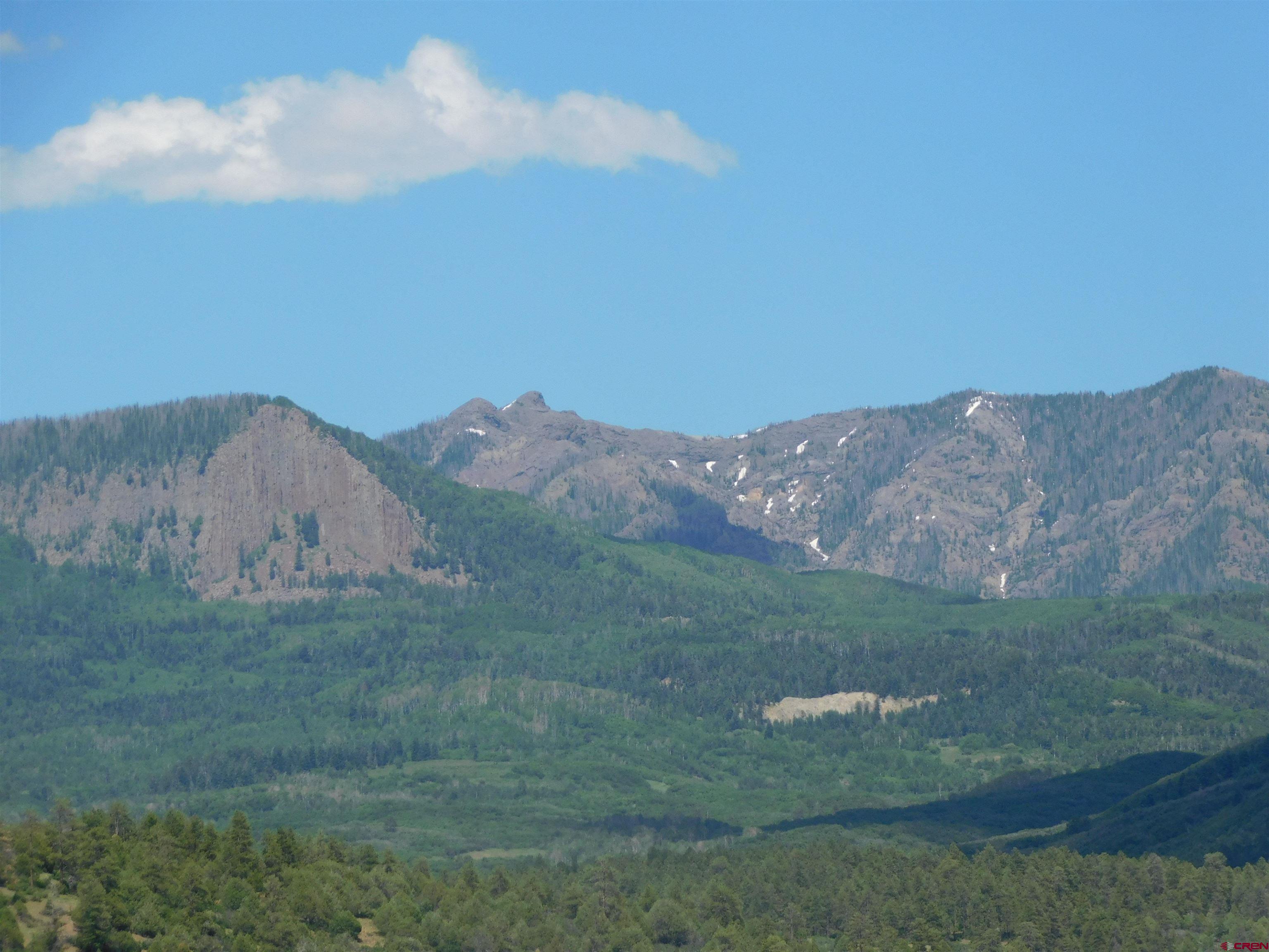 a view of a mountain in the distance