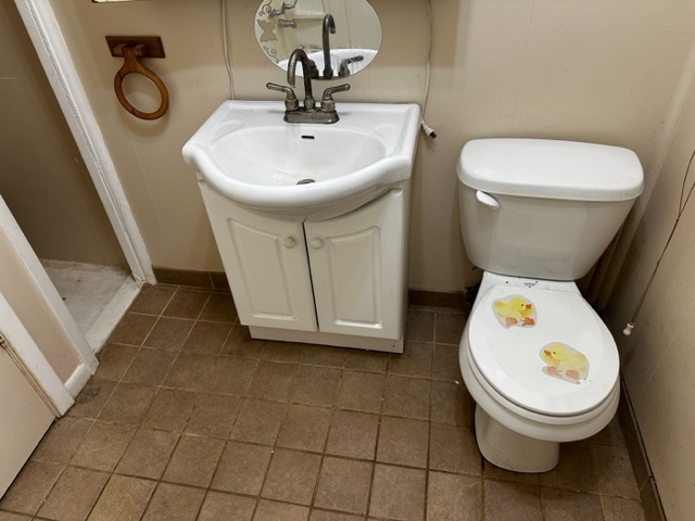 27678 West Stonegate Drive Spring Grove, IL 60081 - Photo 12 of 20 a bathroom with a toilet and a sink