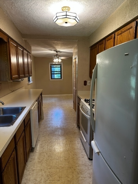 27678 West Stonegate Drive Spring Grove, IL 60081 - Photo 5 of 20 a kitchen with stainless steel appliances granite countertop a sink and a stove top oven