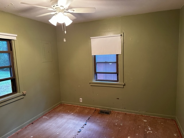 27678 West Stonegate Drive Spring Grove, IL 60081 - Photo 10 of 20 an empty room with windows and fan