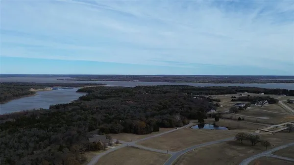a view of a water area with a yard