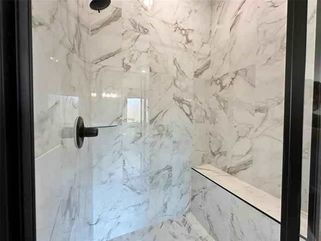 a view of bathtub in bathroom