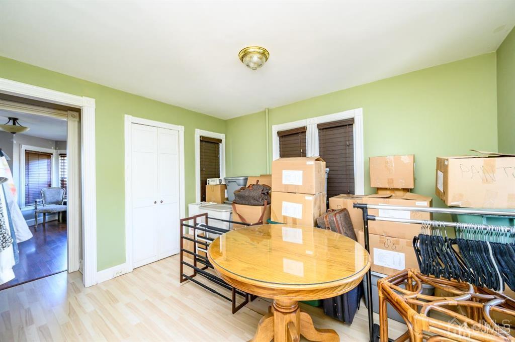 105 New Market Road Dunellen, NJ 08812 - Photo 22 of 39 a view of a dining room with furniture
