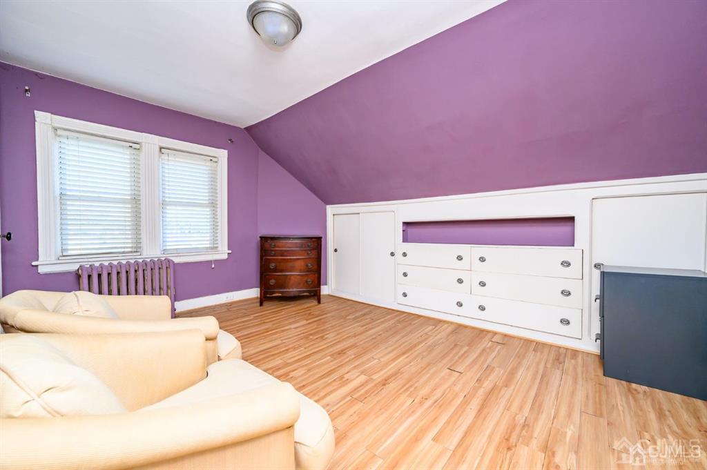 105 New Market Road Dunellen, NJ 08812 - Photo 31 of 39 a living room with furniture