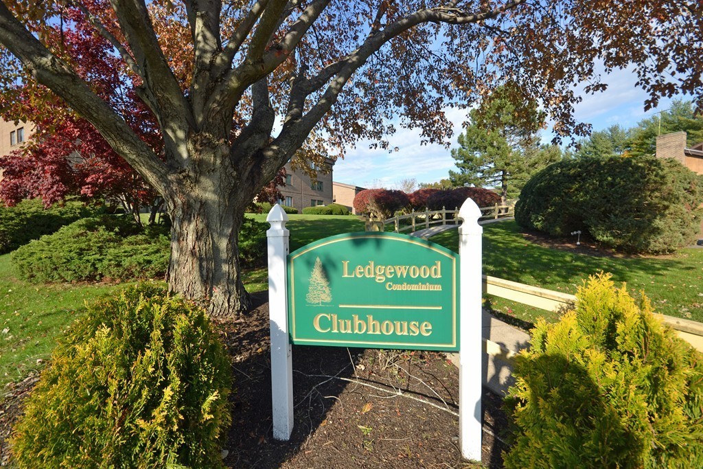 9 Ledgewood Way, Unit 2 Peabody, MA 01960 - Photo 19 of 22 a sign that is on a pole