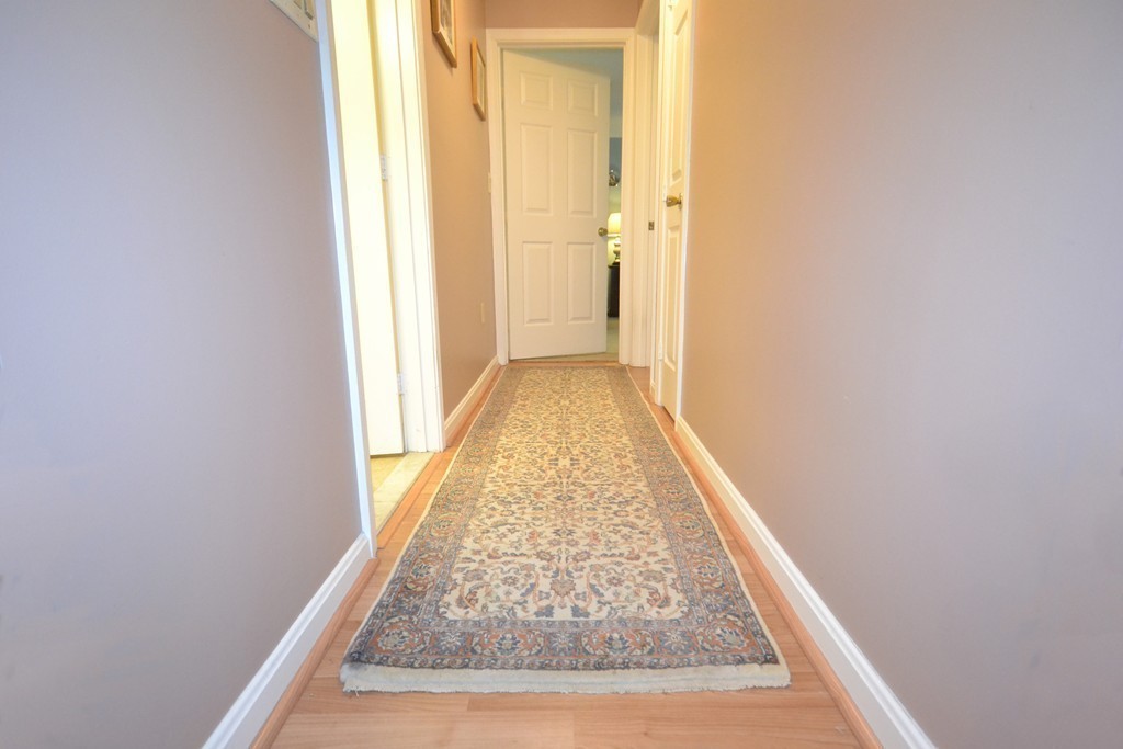 9 Ledgewood Way, Unit 2 Peabody, MA 01960 - Photo 10 of 22 hallway with window