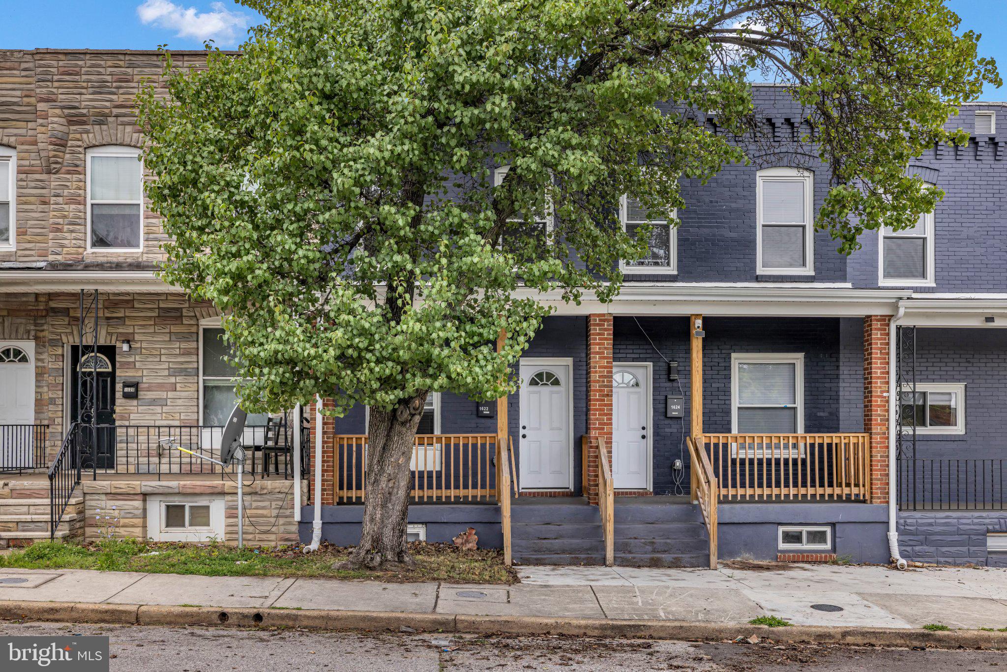 1622 Hazel Street Baltimore, MD 21226 - Photo 2 of 40 Charming row homes with inviting porches.