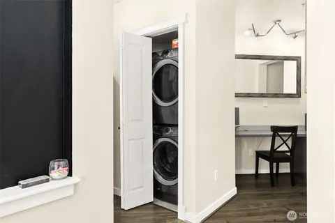 a close view of a utility room with washer and dryer