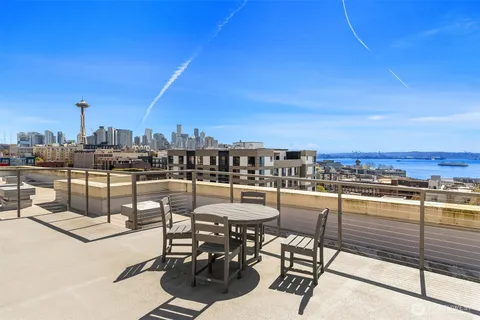 a view of a terrace with seating area