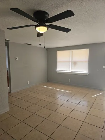 a view of a room and window
