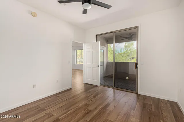 a view of a small space with wooden floor
