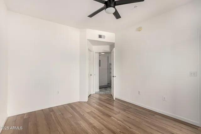 a view of an empty walk in closet