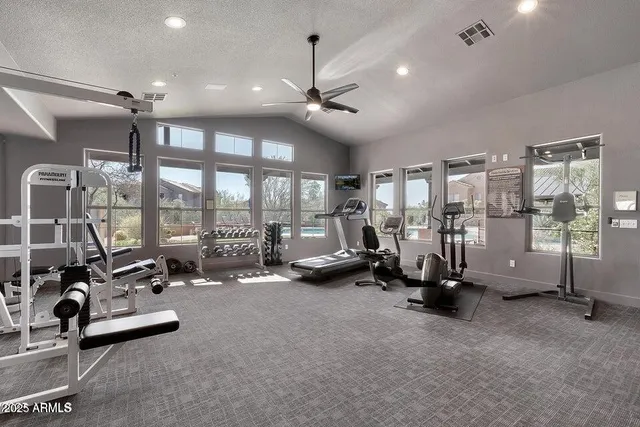 a view of a chairs and tables in the patio