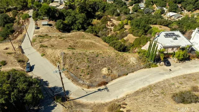 a view of a backyard of the house