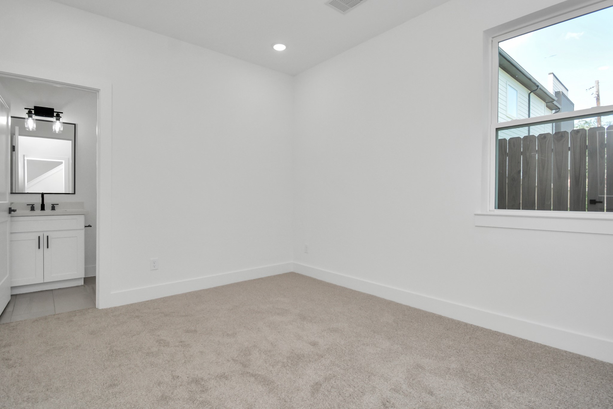 3036 Live Oak Street Houston, TX 77004 - Photo 6 of 35 Photos are of a neighboring home with the same floor plan and similar finishes.
