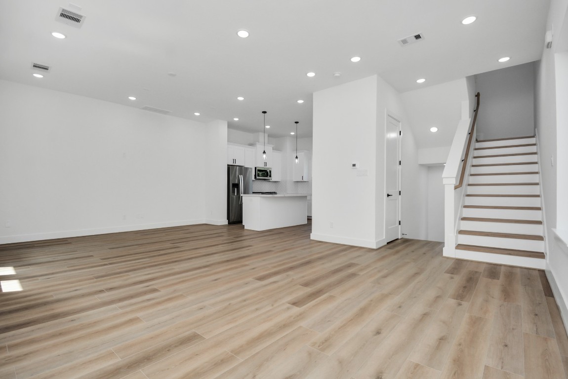 3036 Live Oak Street Houston, TX 77004 - Photo 9 of 35 a view of a big room with wooden floors
