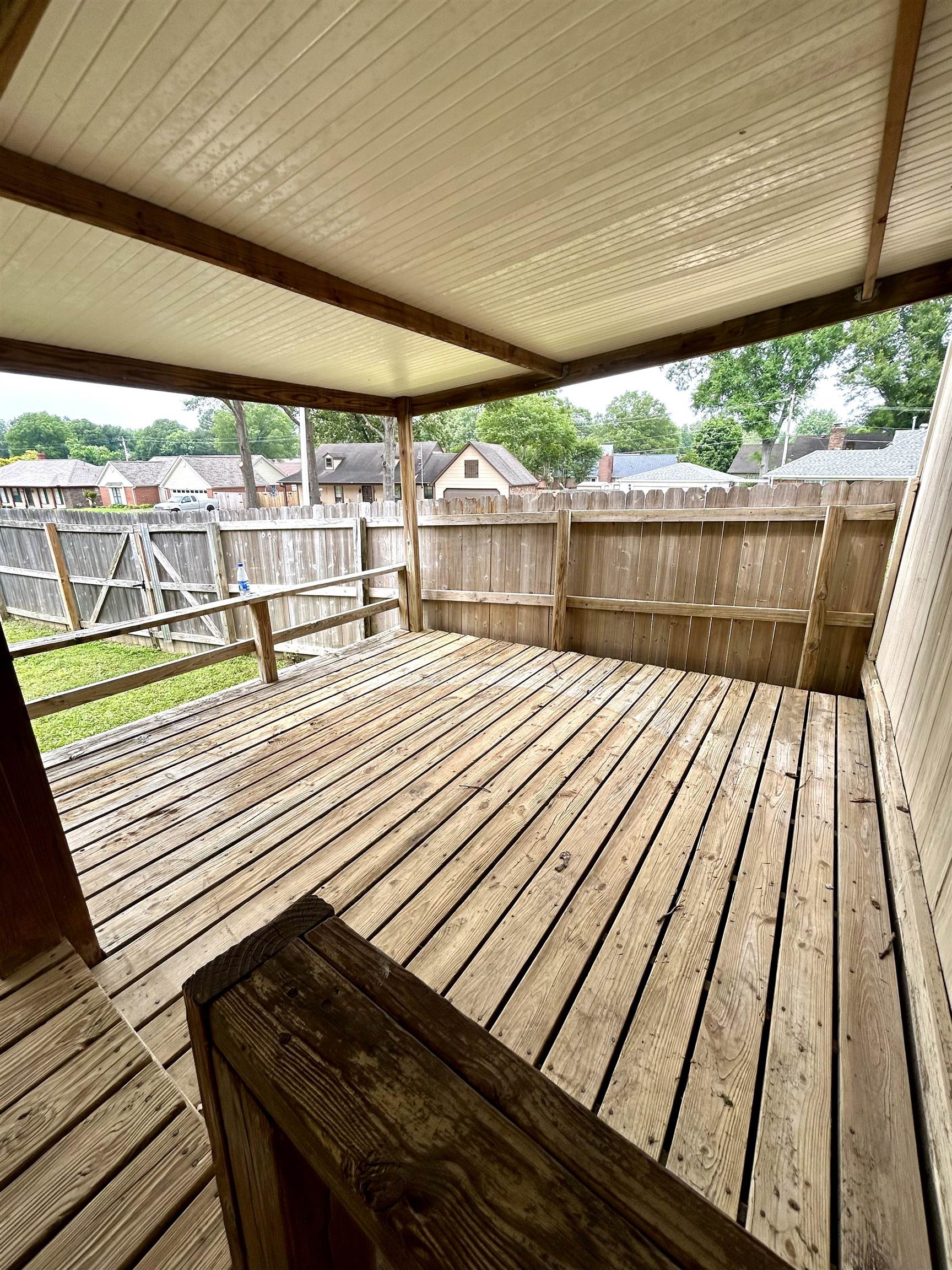 3257 Altruria Road Bartlett, TN 38134 - Photo 23 of 27 Wooden deck with a fenced backyard