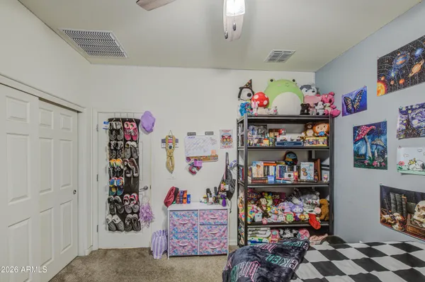a living room with lots of baby toys