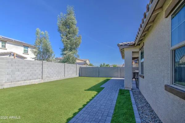 a view of a backyard with a garden