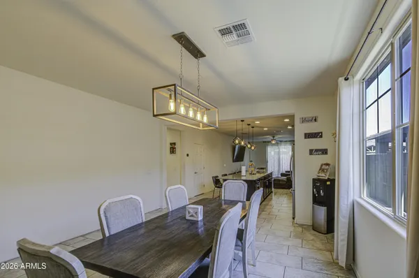 a view of a dining room with furniture