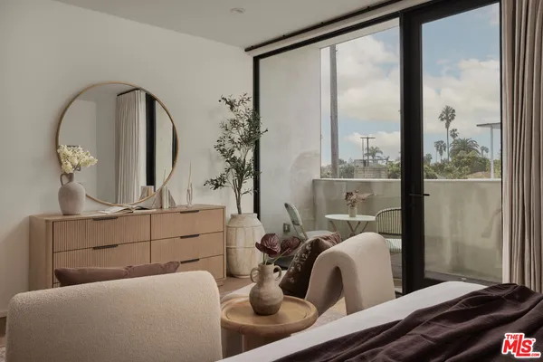 a room with furniture and a mirror