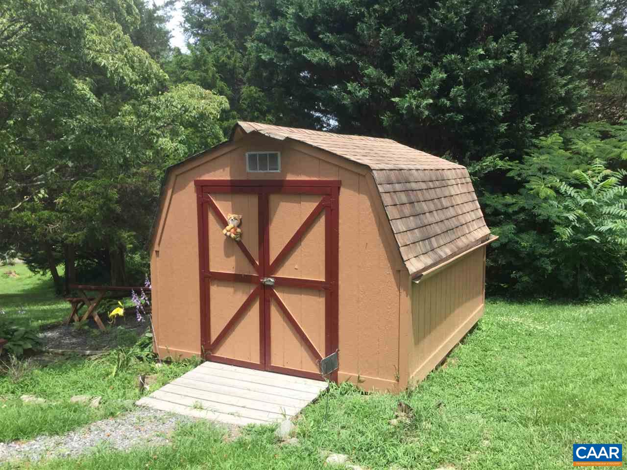 374 Pine Bluff Road Ruckersville, VA 22968 - Photo 13 of 24 a view of backyard with a barn and a cactus plant